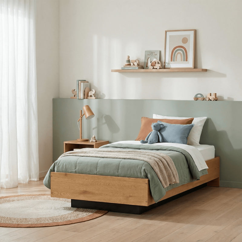 Bedroom with wooden bed, green bedding, and decorative items on a shelf.