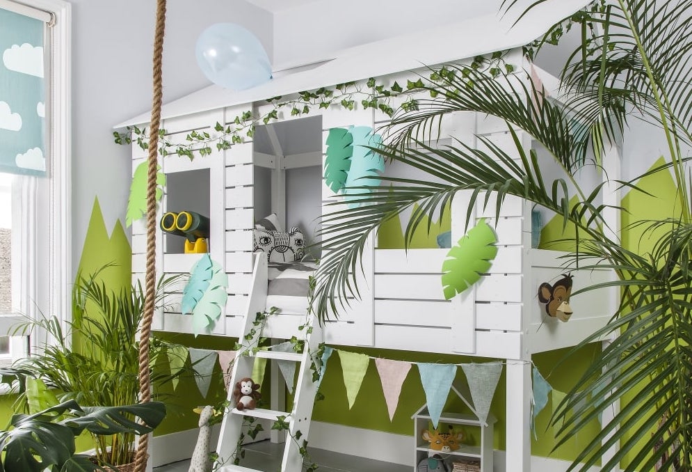 jungle themed bedroom ideas white jungle themed cabin bed with ladder and jungle plants